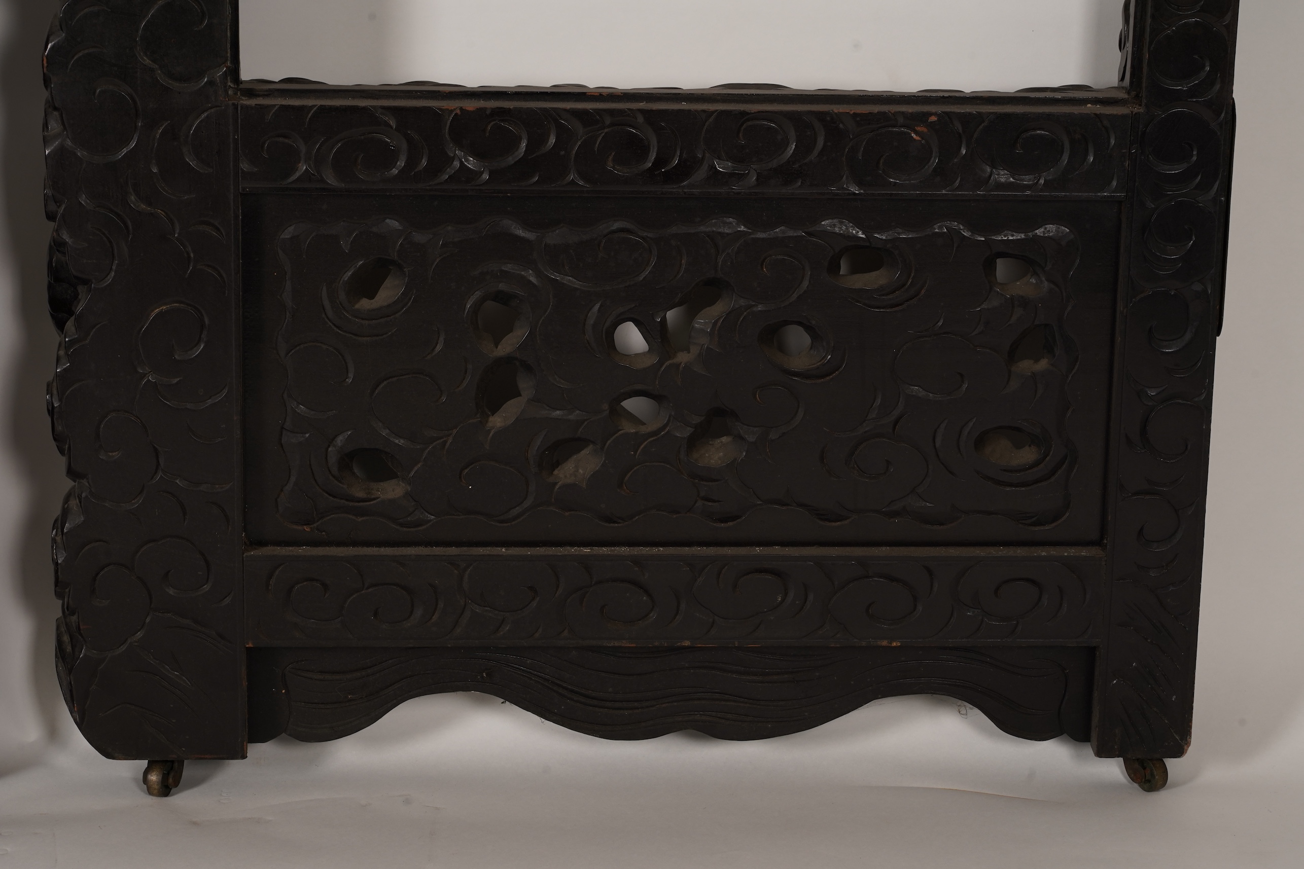 A pair of large Japanese carved hardwood ’dragon’ screen frames, Meiji period